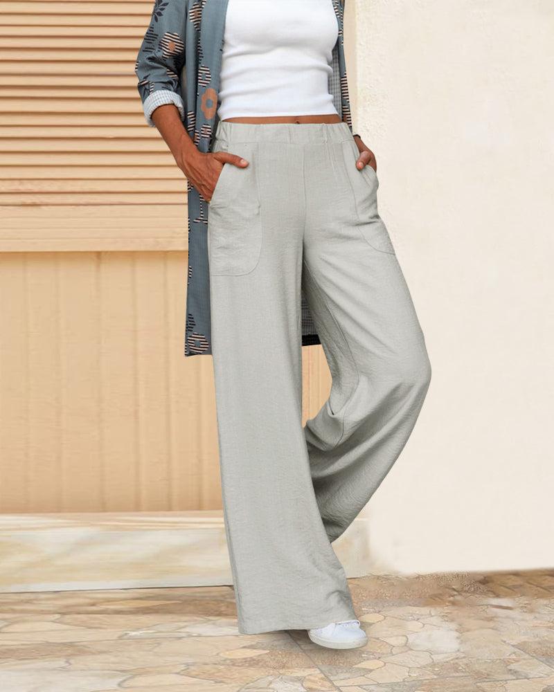 Valenzora | Slim high-waisted trousers in a solid color