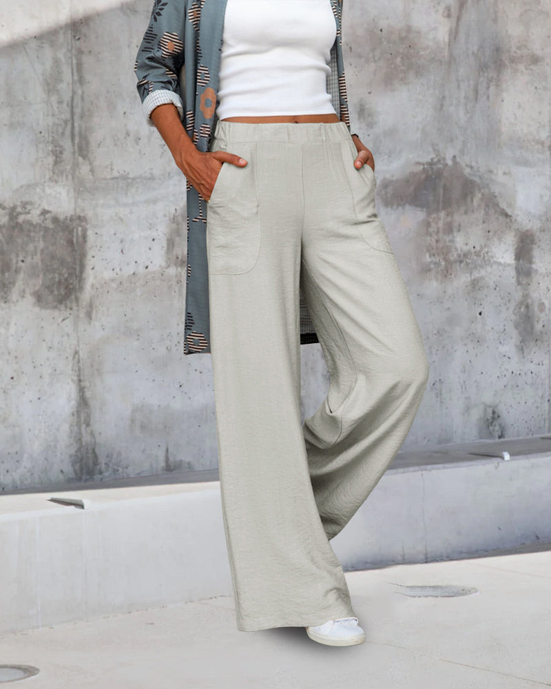 Valenzora | Slim high-waisted trousers in a solid color
