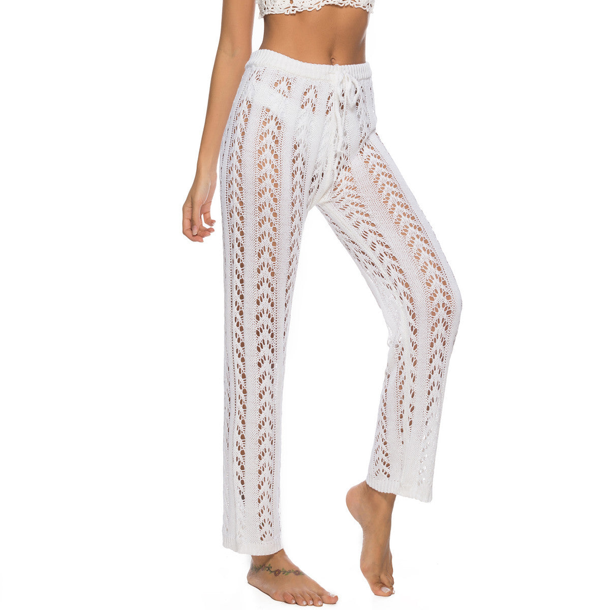 Women's elegant crochet beach trousers with a breezy fit and elastic waistband, size