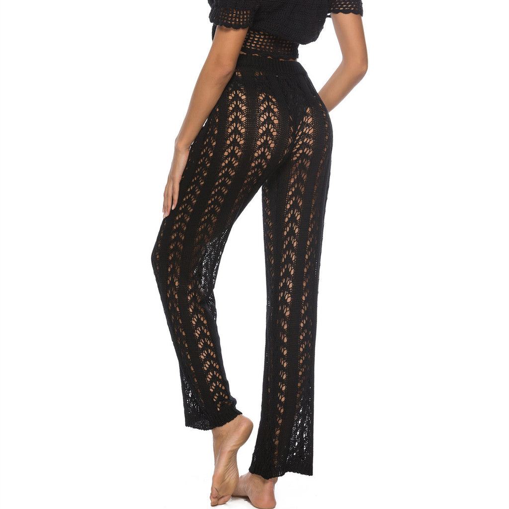 Women's elegant crochet beach trousers with a breezy fit and elastic waistband, size
