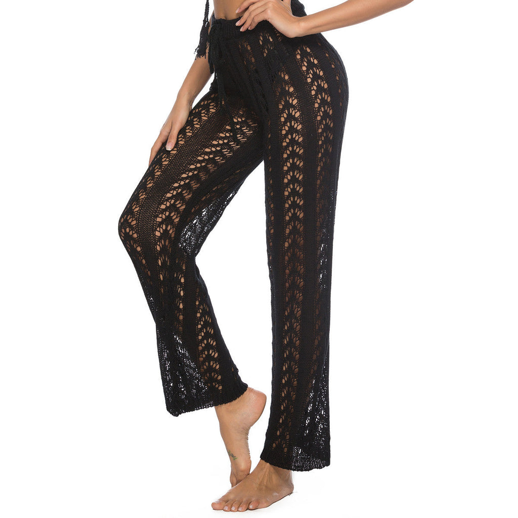 Women's elegant crochet beach trousers with a breezy fit and elastic waistband, size