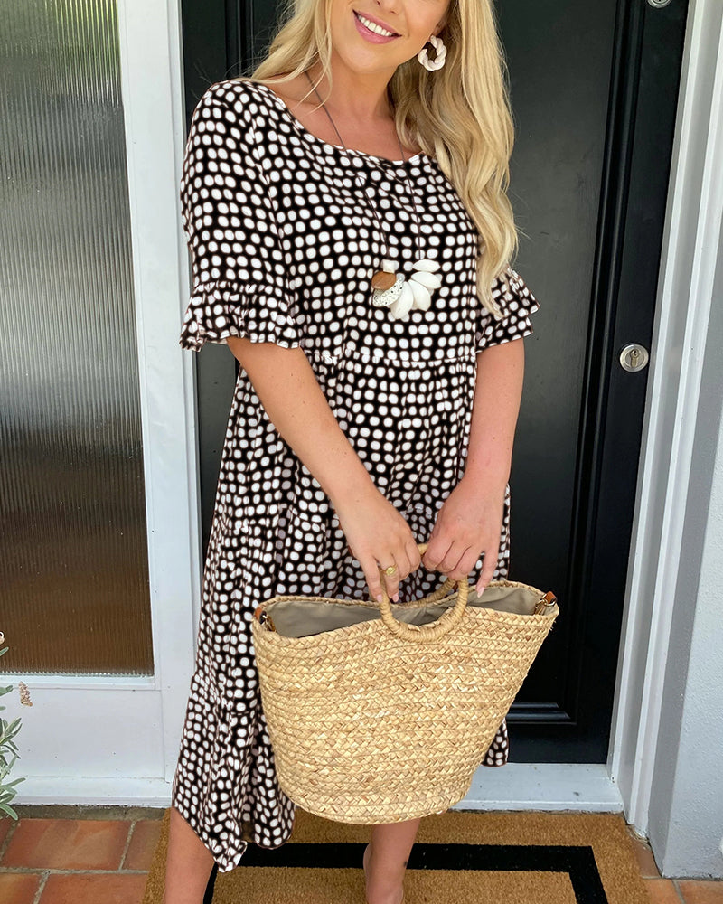 Midi dress with round neckline and polka dot print