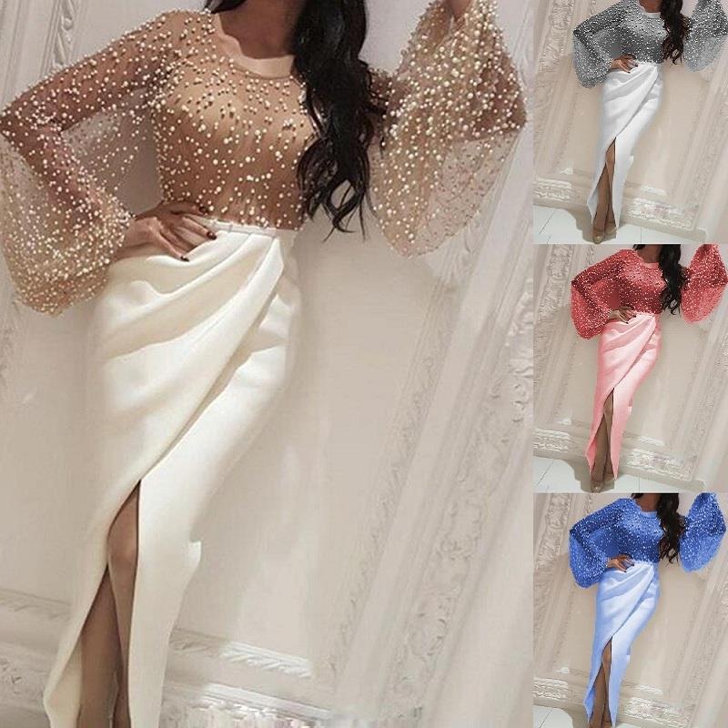 Women's long-sleeved blouse with sparkling pearl details and a figure-hugging cut, size [size missing]