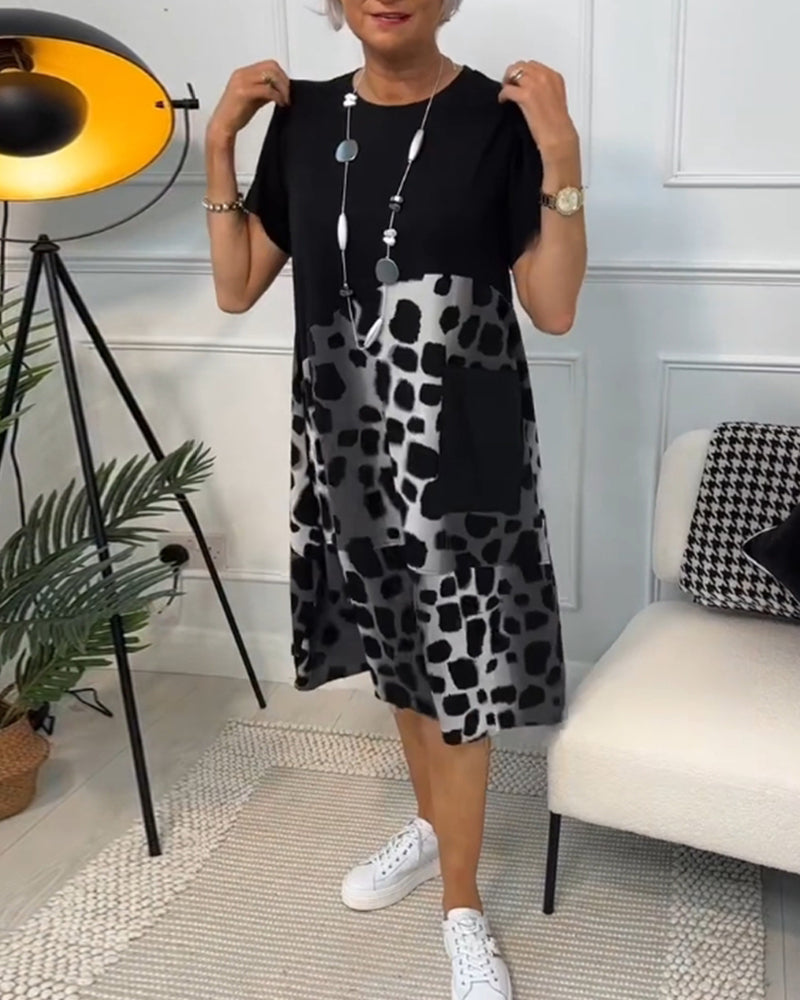 Valenzora | Short-sleeved, printed dress with a round neckline