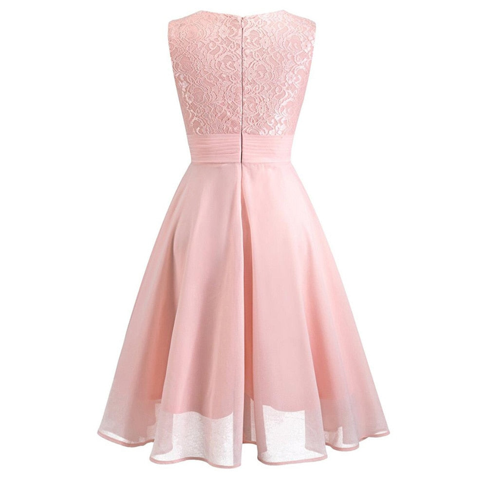 Valenzora | Elegant dress with short sleeves, sequins and ruffles