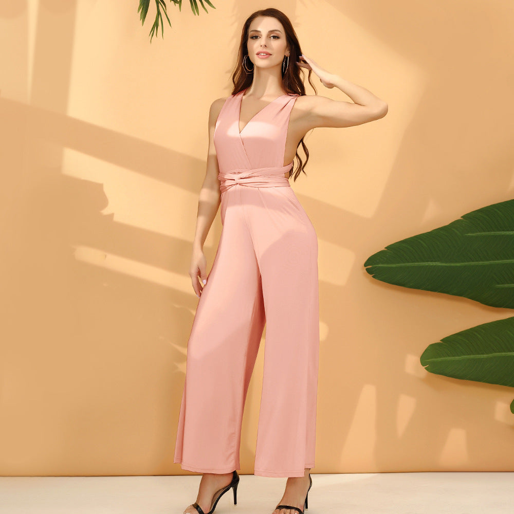 Women's elegant jumpsuit with deep V-neck and innovative wrap design, size S
