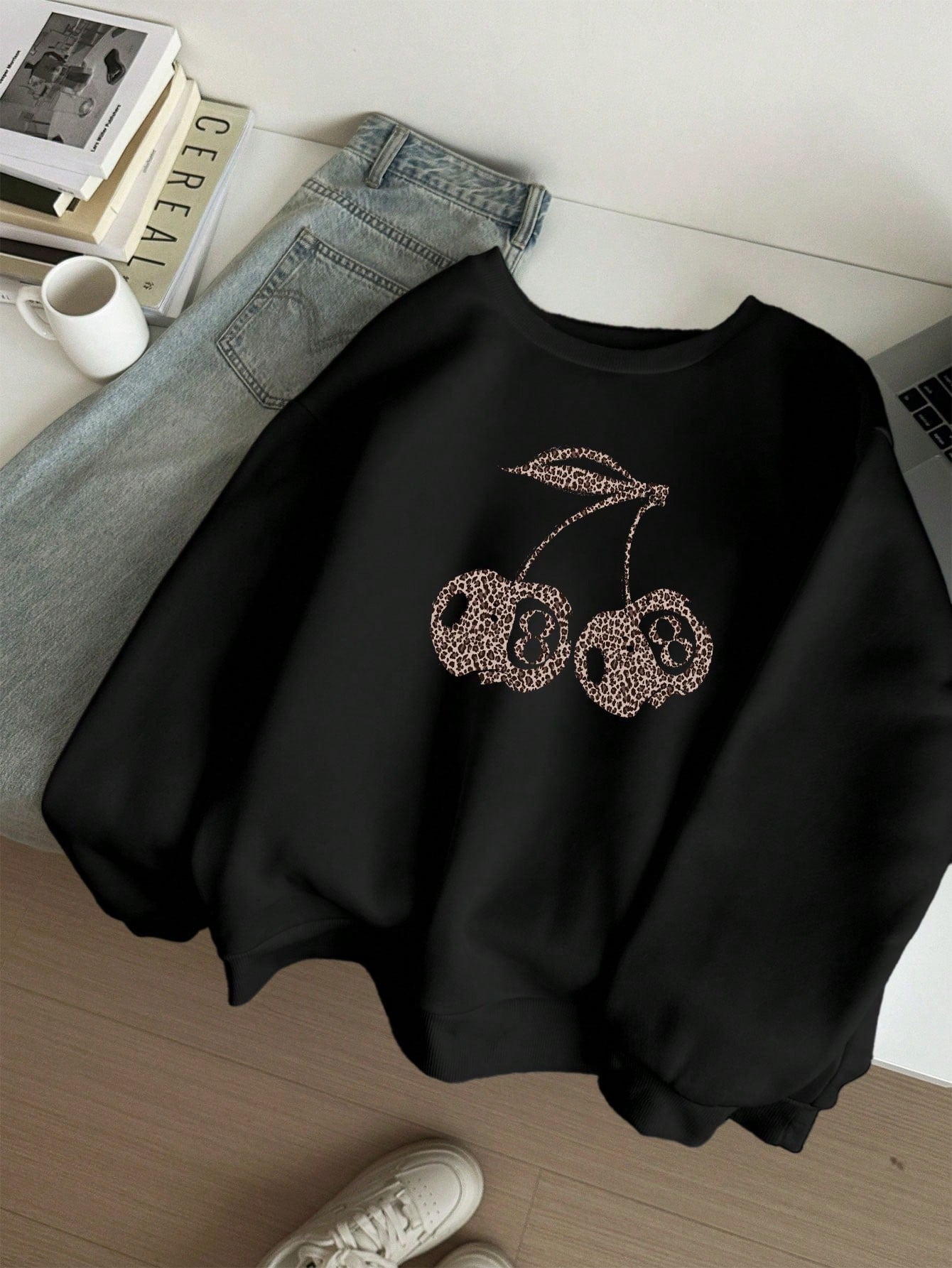 Valenzora | Casual leopard and cherry graphic sweatshirt in black