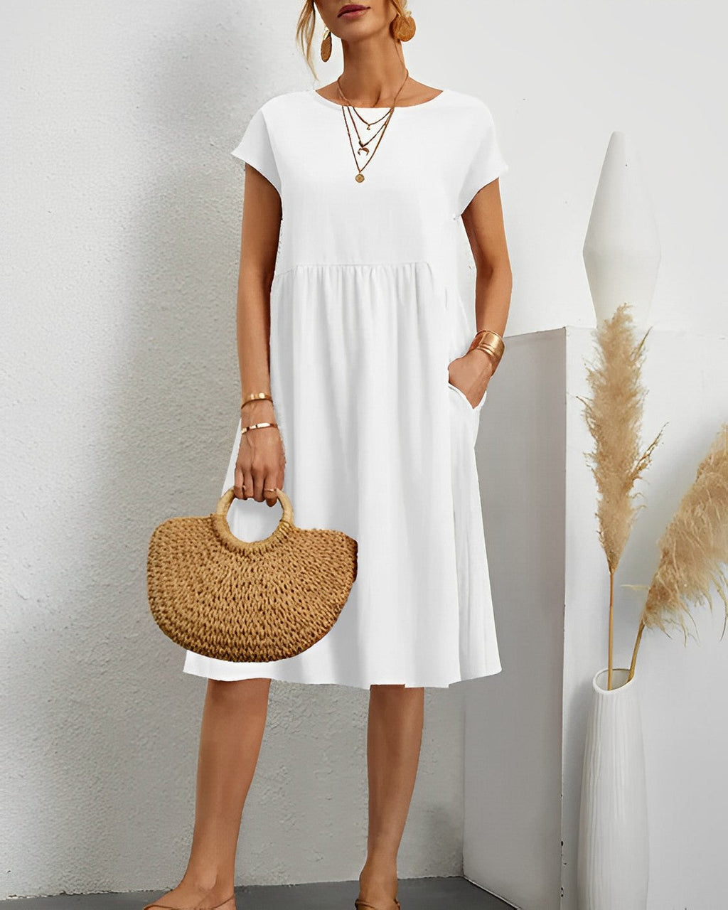 Valenzora | Midi dress with side pockets