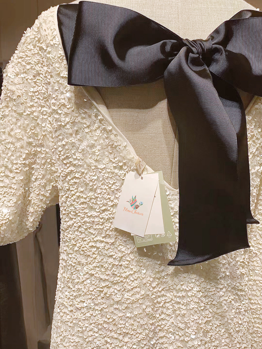 Valenzora Dress | Elegant glitter dress with a bow closure at the back