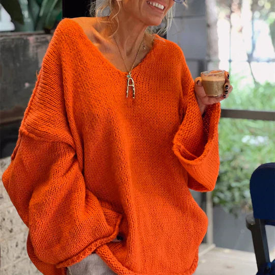 Damenpullover mit V-Ausschnitt und Details aus Grobstrick