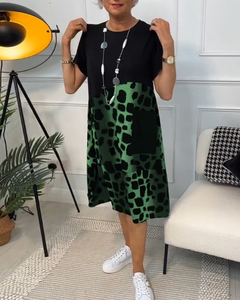 Valenzora | Short-sleeved, printed dress with a round neckline