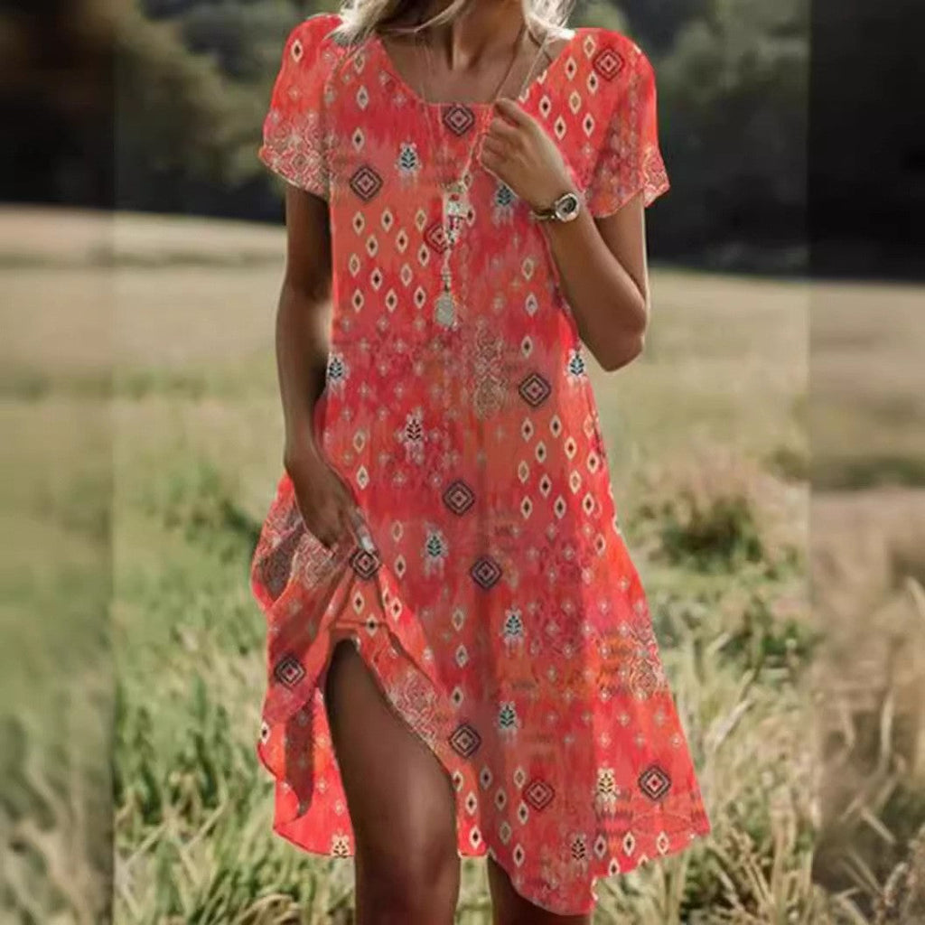 Valenzora | Short-sleeved green mini dress with polka dots