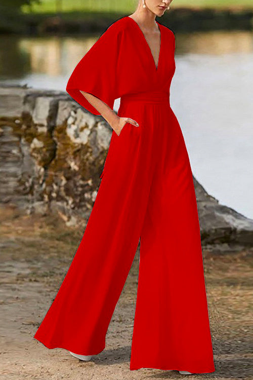 Valenzora | Rosiedress Jumpsuit mit tiefem V-Ausschnitt, hoher Taille und weitem Bein