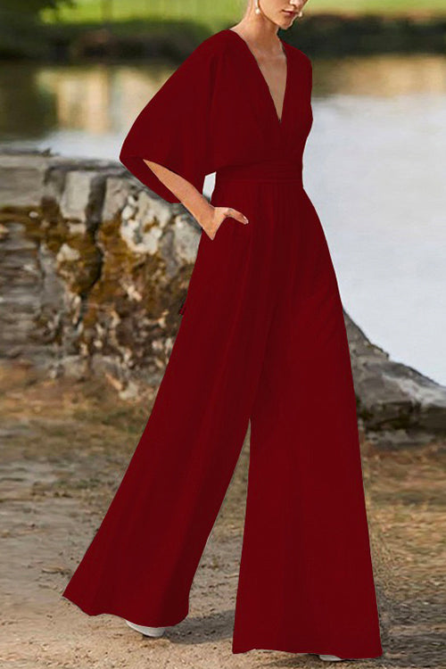 Valenzora | Rosiedress Jumpsuit mit tiefem V-Ausschnitt, hoher Taille und weitem Bein
