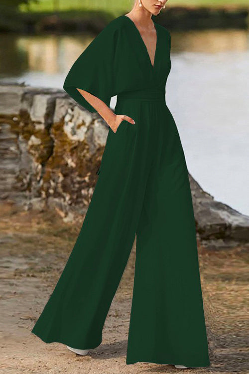 Valenzora | Rosiedress Jumpsuit mit tiefem V-Ausschnitt, hoher Taille und weitem Bein