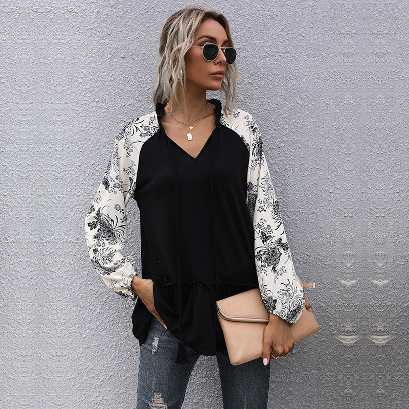 Women's hooded sweatshirt with floral design and peplum cut, size S