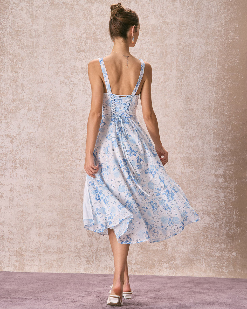Blue midi dress with floral pattern and square neckline
