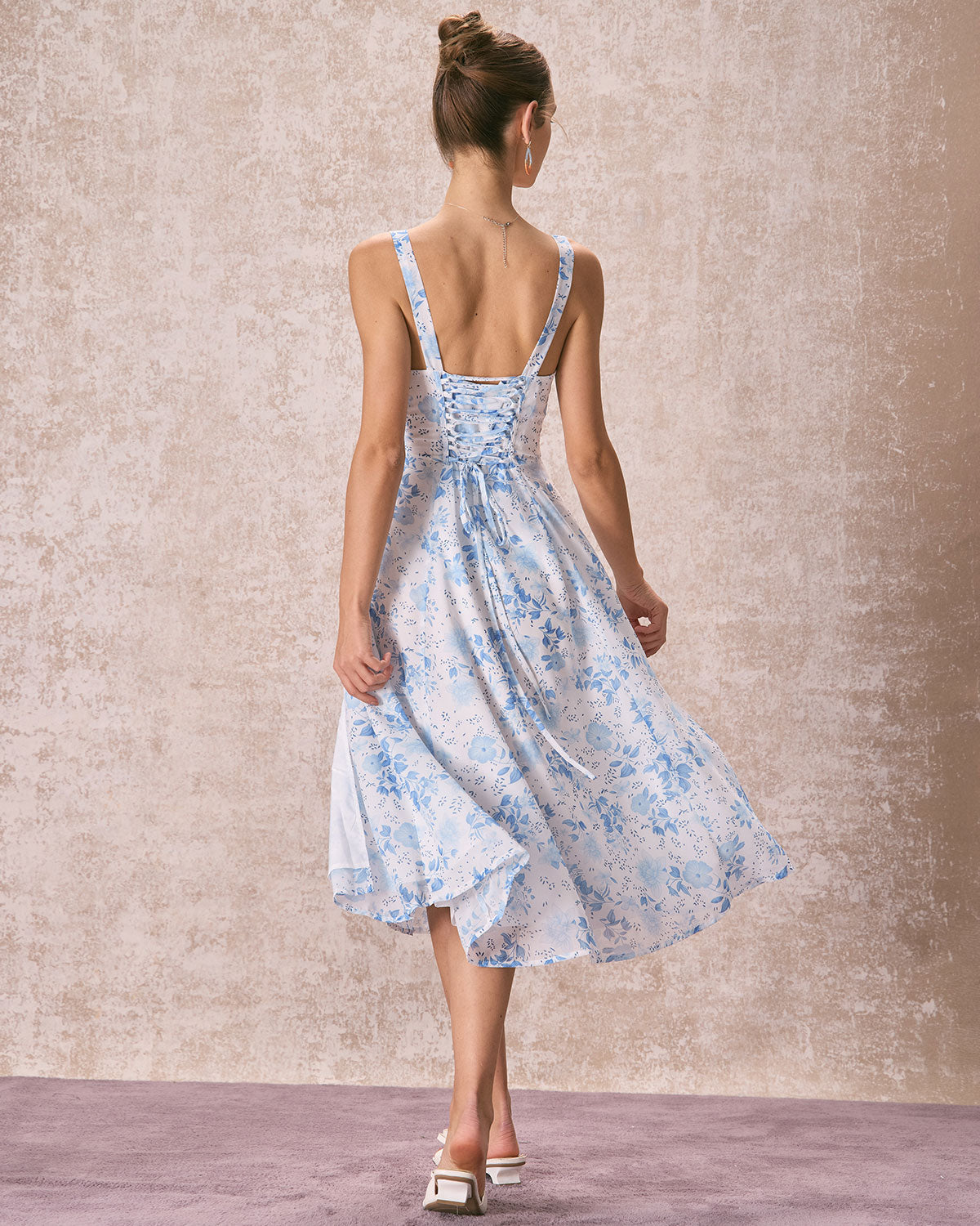 Blue midi dress with floral pattern and square neckline