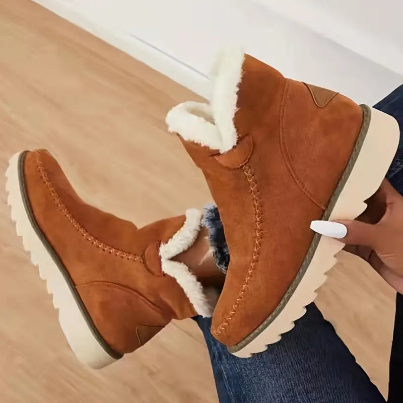 Women's boots made of plush sheepskin