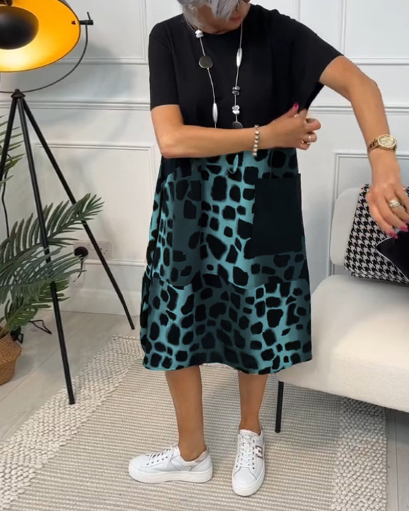 Valenzora | Short-sleeved, printed dress with a round neckline