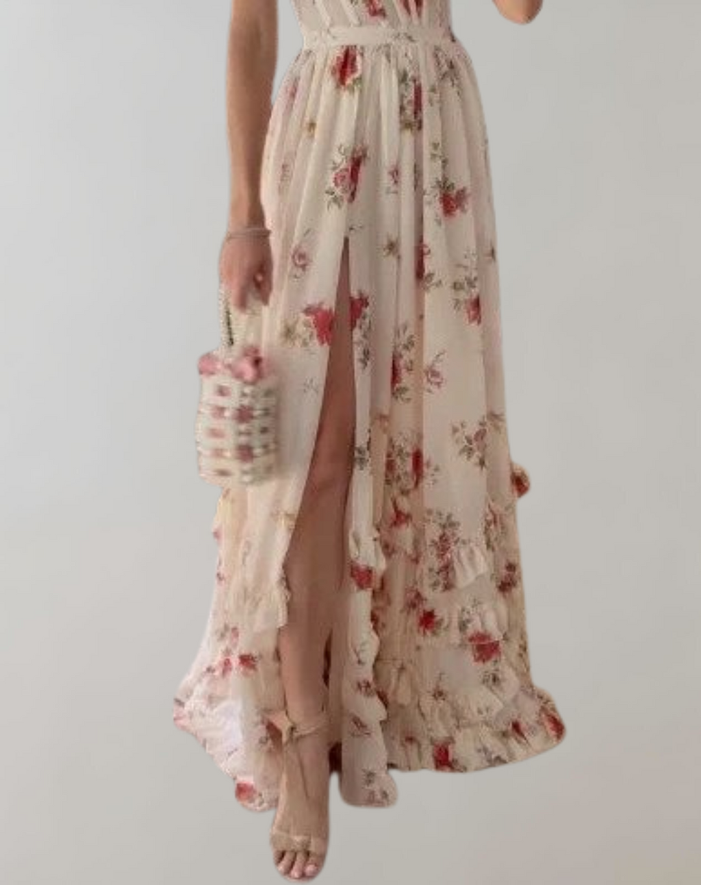 Valenzora | Ärmelloses, tailliertes Kleid mit Blumendruck und sexy Beinausschnitt