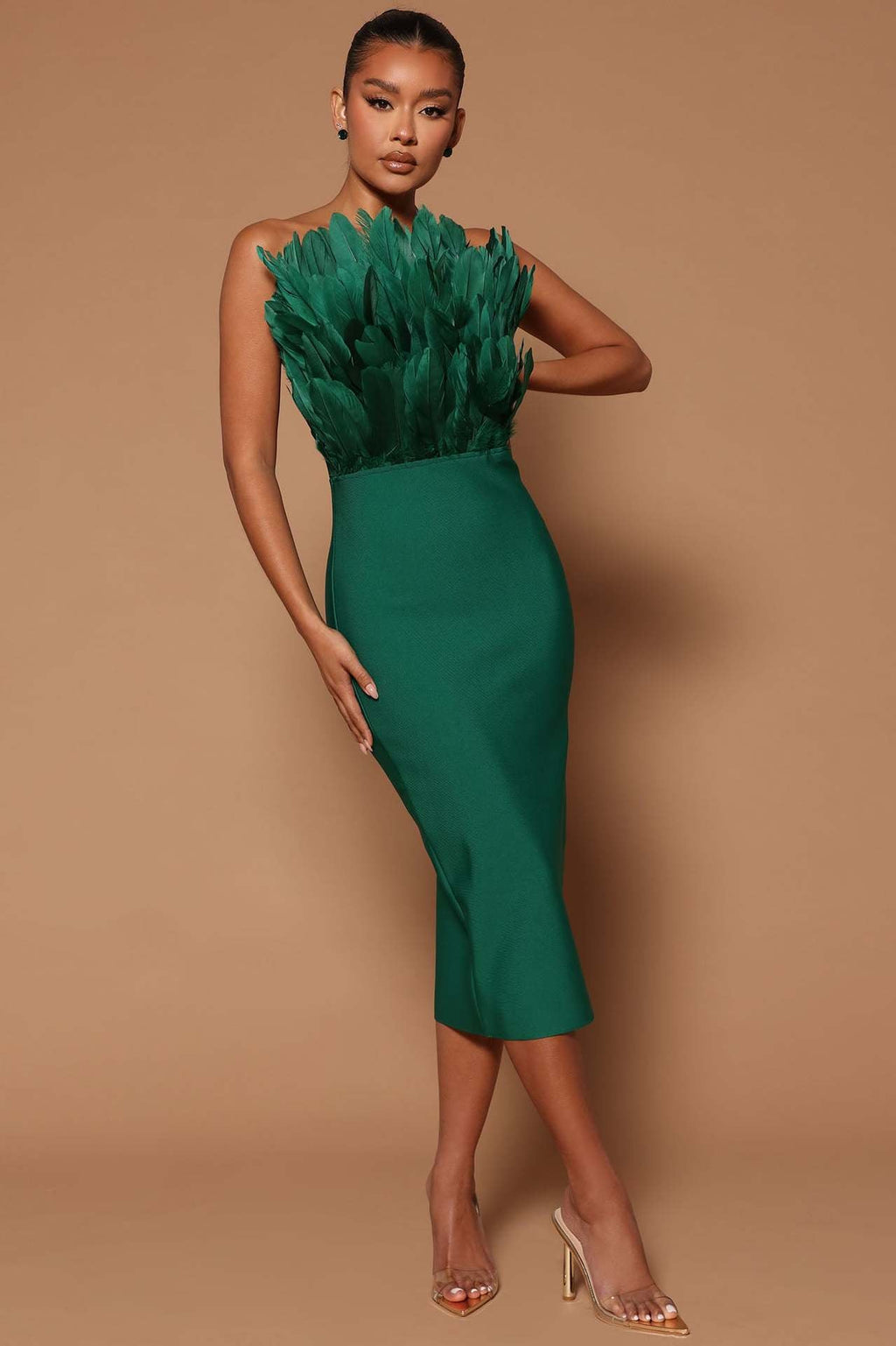 Valenzora women's dress with waist accentuation and feather embellishment