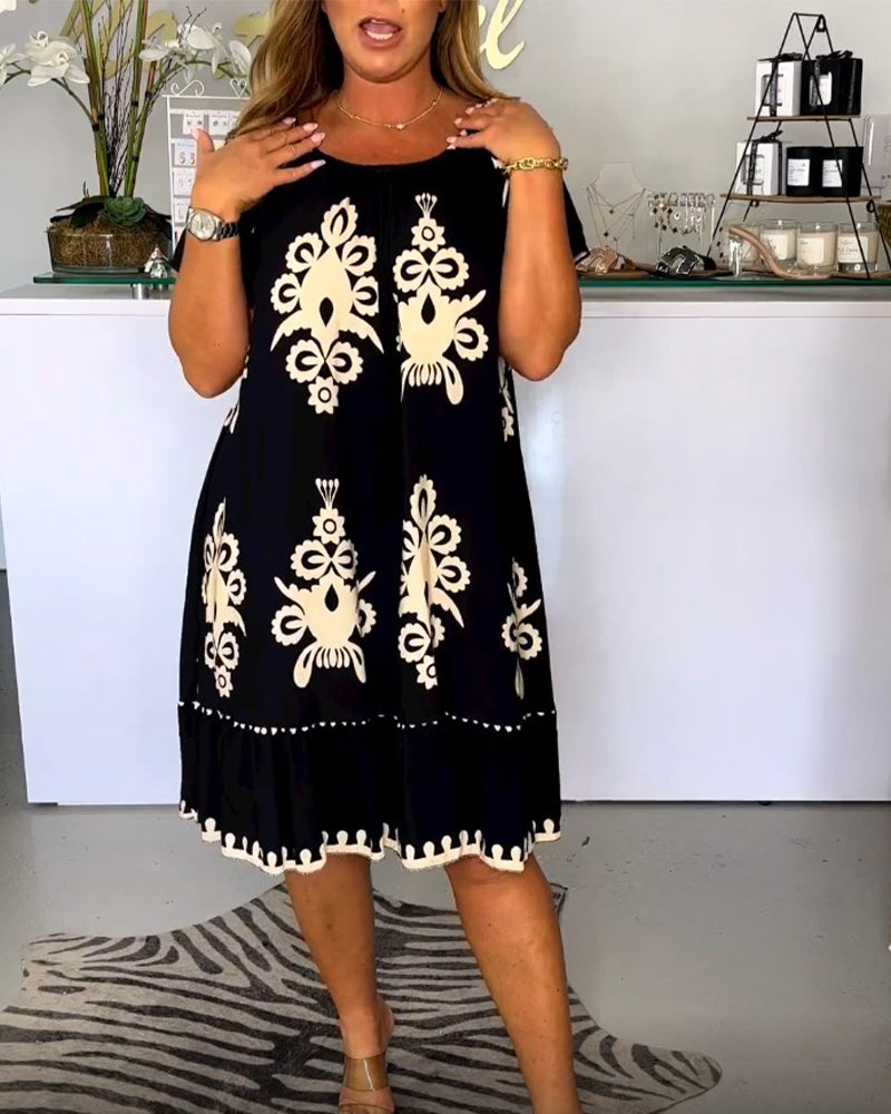 Valenzora | Printed dress with a round neck