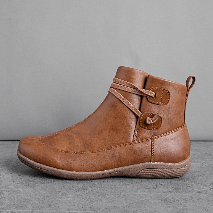 Ankle boots with straps