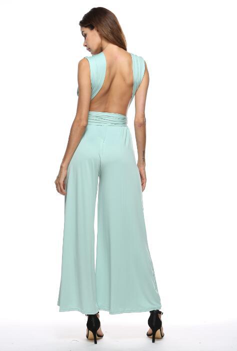 Women's elegant jumpsuit with deep V-neck and innovative wrap design, size S