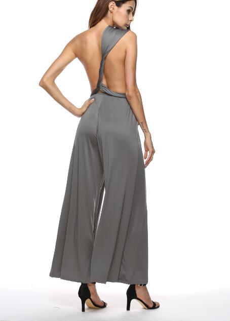 Women's elegant jumpsuit with deep V-neck and innovative wrap design, size S