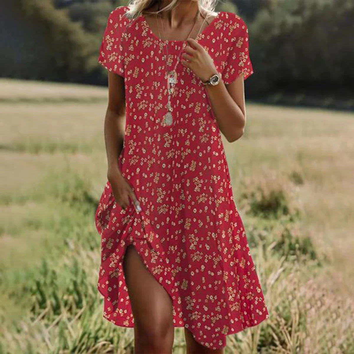 Valenzora | Short-sleeved green mini dress with polka dots