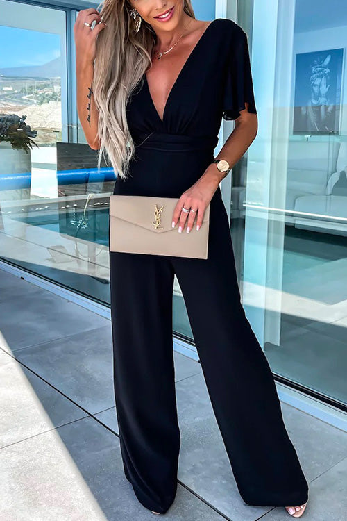 Valenzora | Rosiedress Jumpsuit mit tiefem V-Ausschnitt, Rüschenärmeln, hoher Taille und weitem Bein