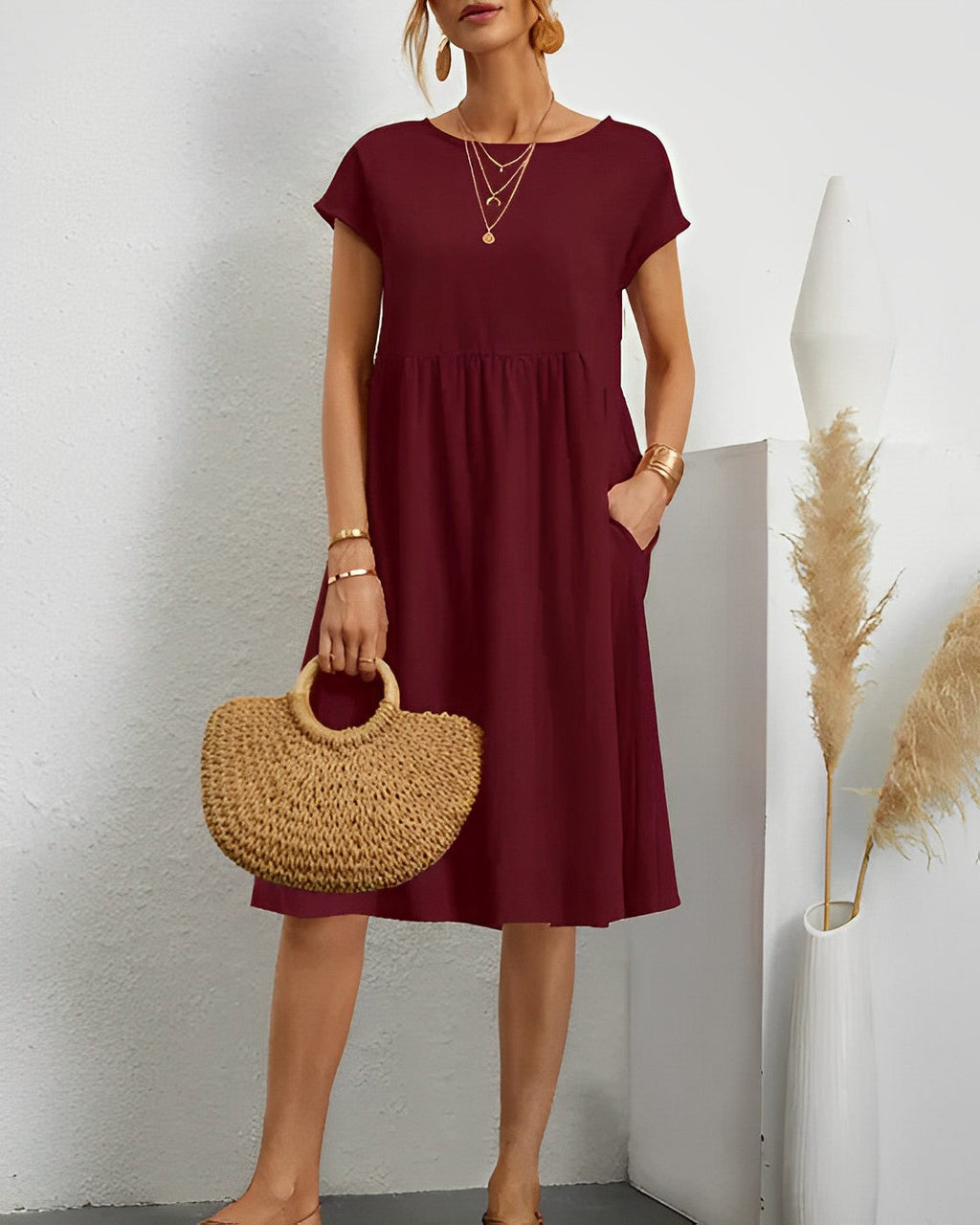 Valenzora | Midi dress with side pockets