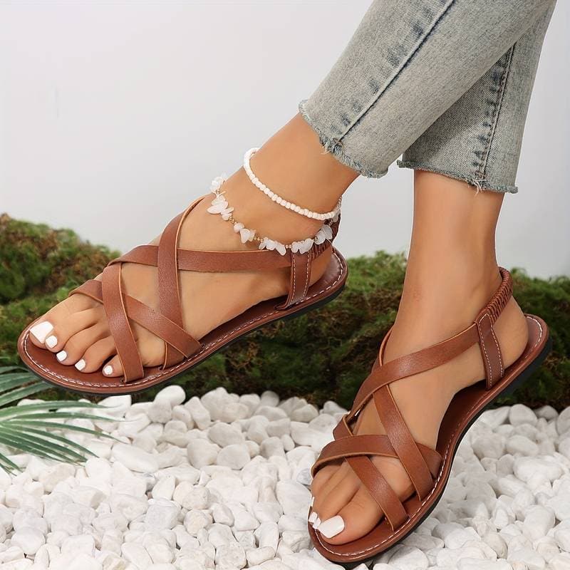 Valenzora | Comfortable flat sandals with cross straps, stylish and relaxed