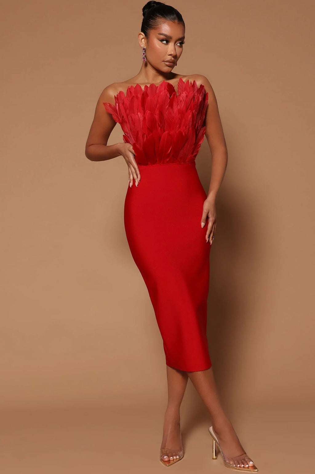 Valenzora women's dress with waist accentuation and feather embellishment