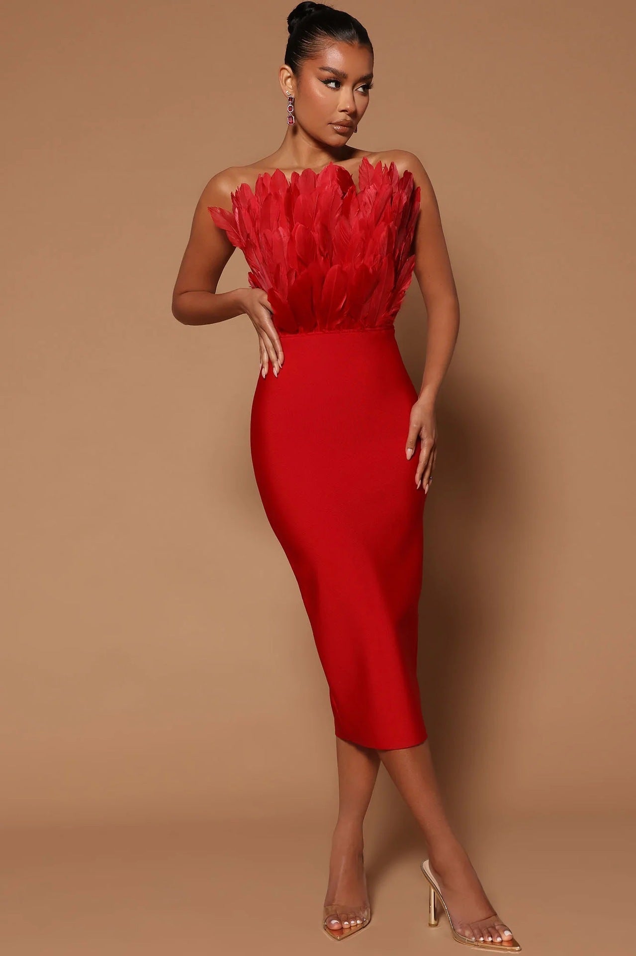 Valenzora women's dress with waist accentuation and feather embellishment