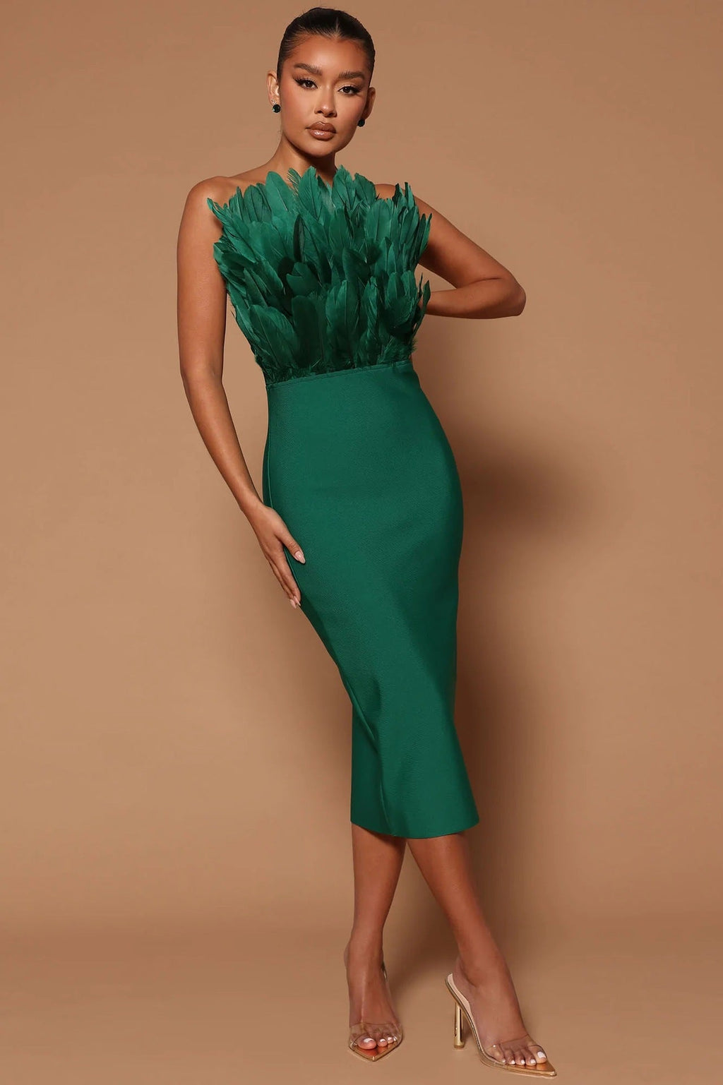 Valenzora women's dress with waist accentuation and feather embellishment
