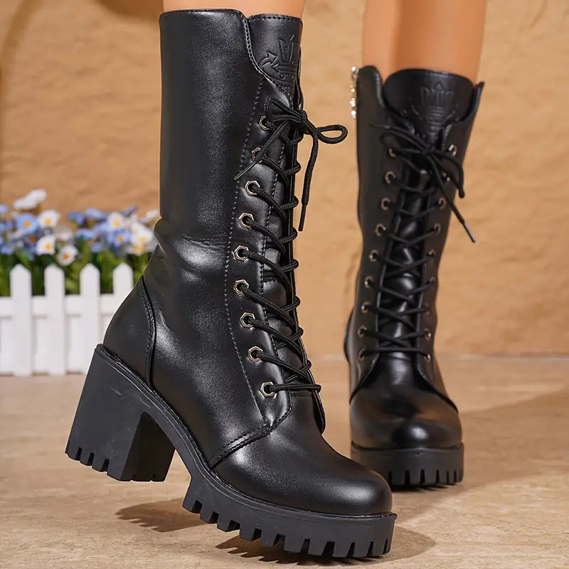 – Elegant boots with a block heel and mid-calf shaft height
