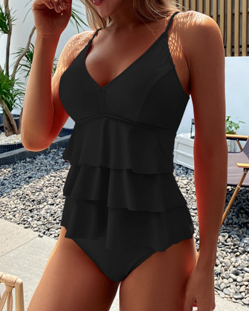 Valenzora | Split-style tankini with ruffles in a solid color