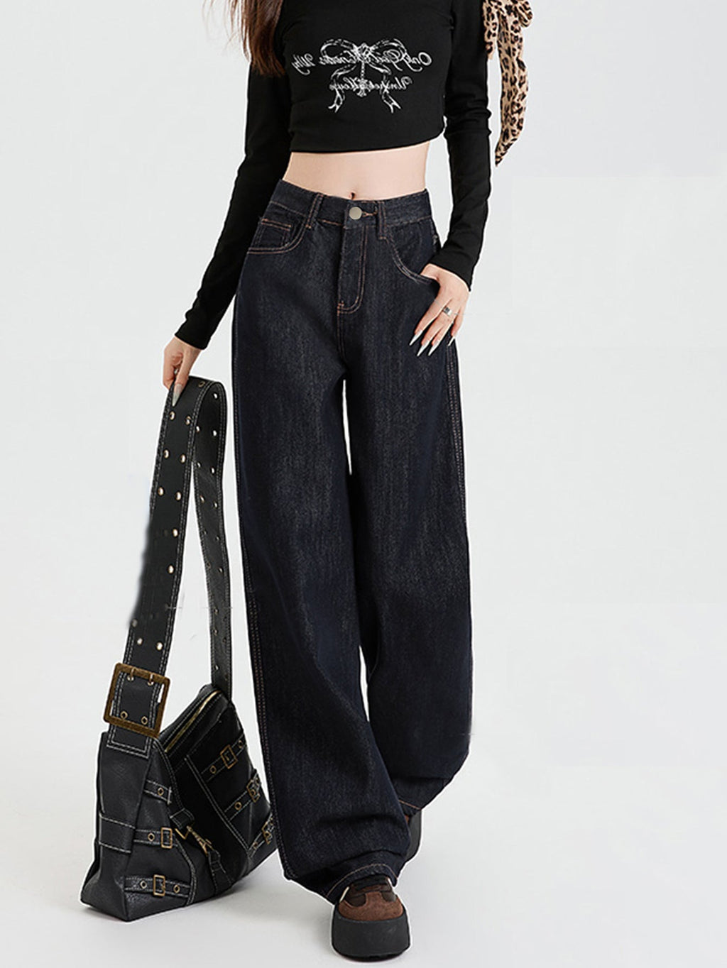 Valenzora | Loose-fitting dark high-waisted floor-length denim trousers