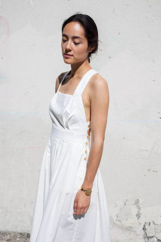 Valenzora | Backless, pleated dress with large pockets