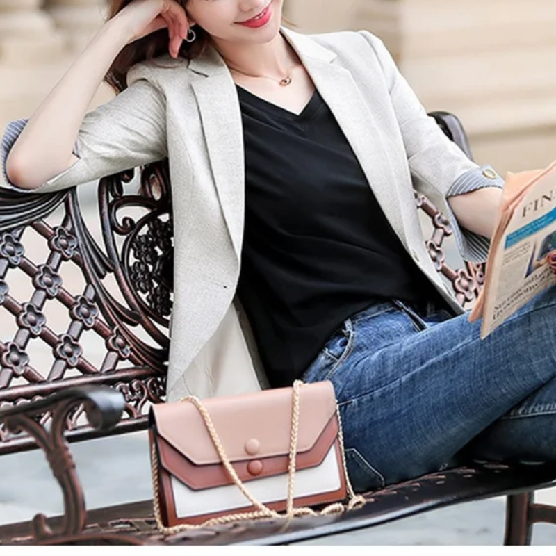 Valenzora | Elegant women's blazer with button details. Ideal for the office.