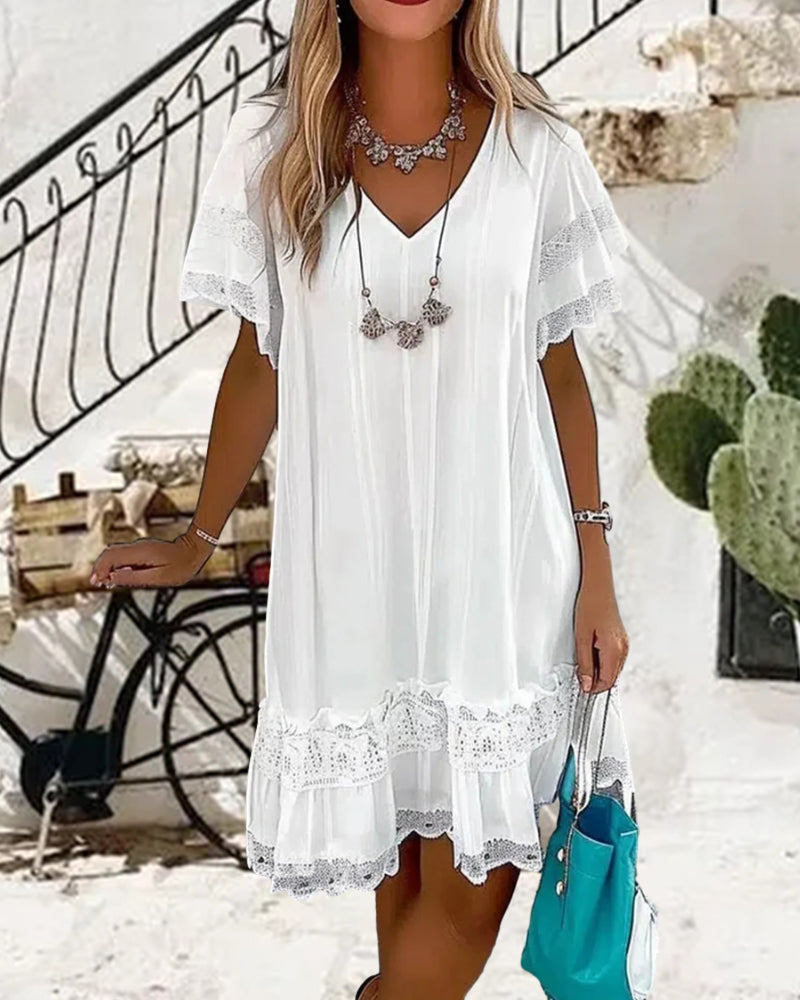 Valenzora | Short-sleeved white summer dress with lace panels