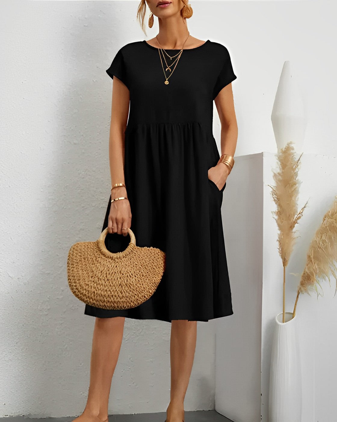Valenzora | Midi dress with side pockets