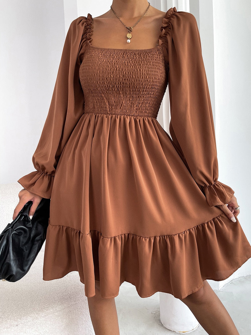 Dress - Radiate feminine elegance in this ruffled mini dress!