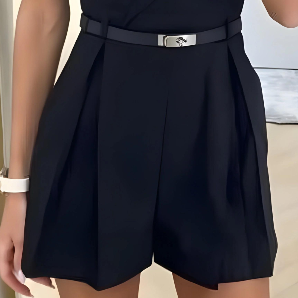 Valenzora | Sleeveless jumpsuit with wrap V-neck, fitted belt, pleated shorts, and tailored fit