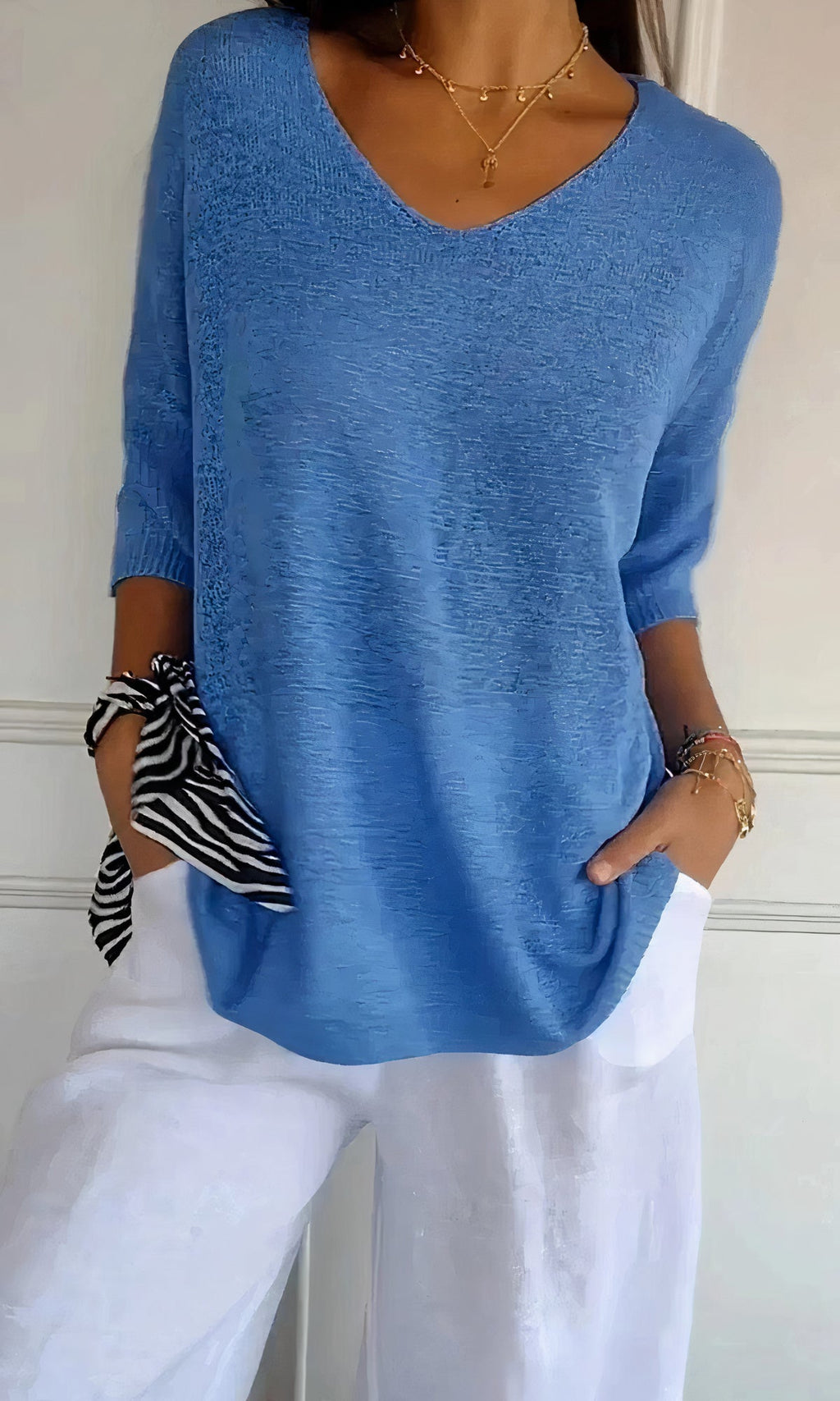 Knitted V-neck top for women