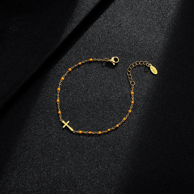 Valenzora | Gold-tone cross bracelet