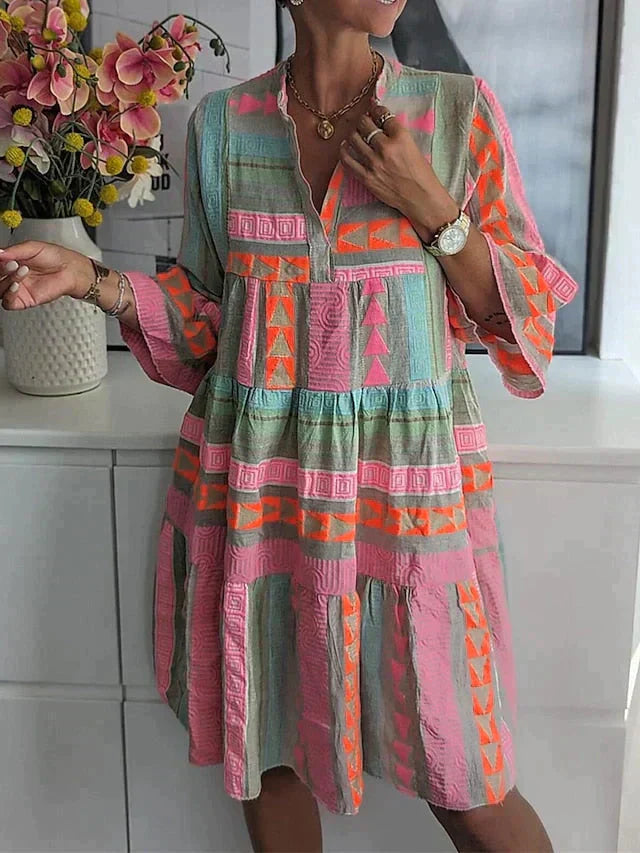 Valenzora | Sommerkleid mit halblangen Ärmeln, locker geschnitten und mit Rüschen