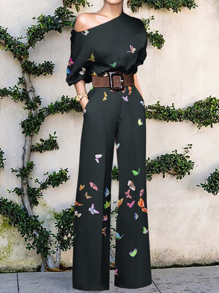Valenzora | Strapless jumpsuit with floral pattern